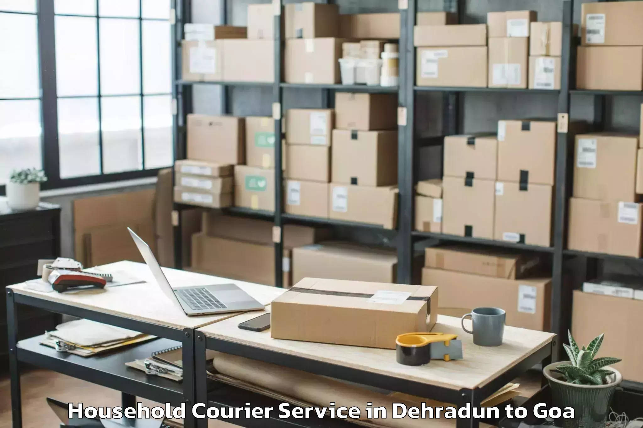 Affordable Dehradun to Mopa Household Courier